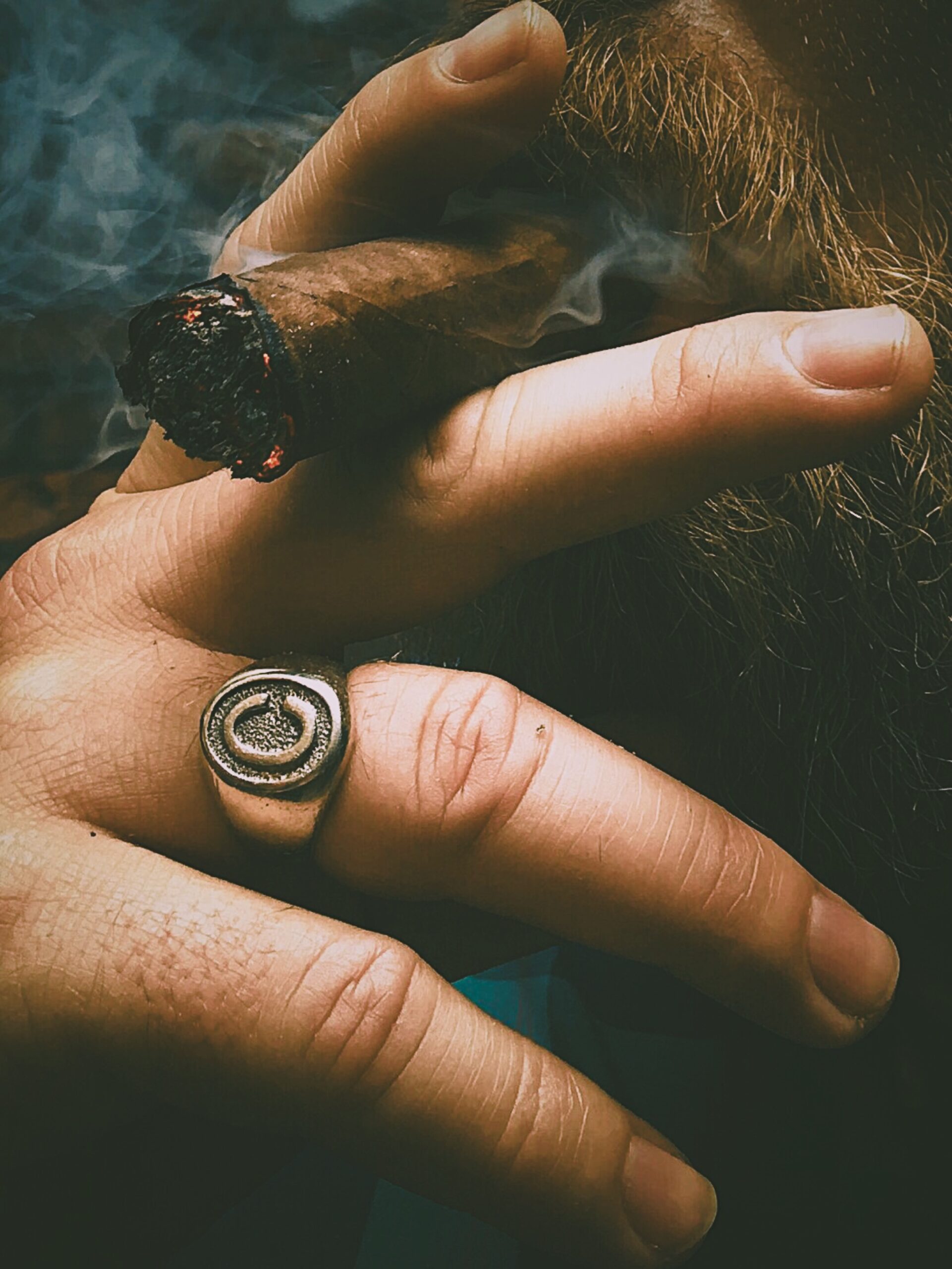 image of man smoking a cigar